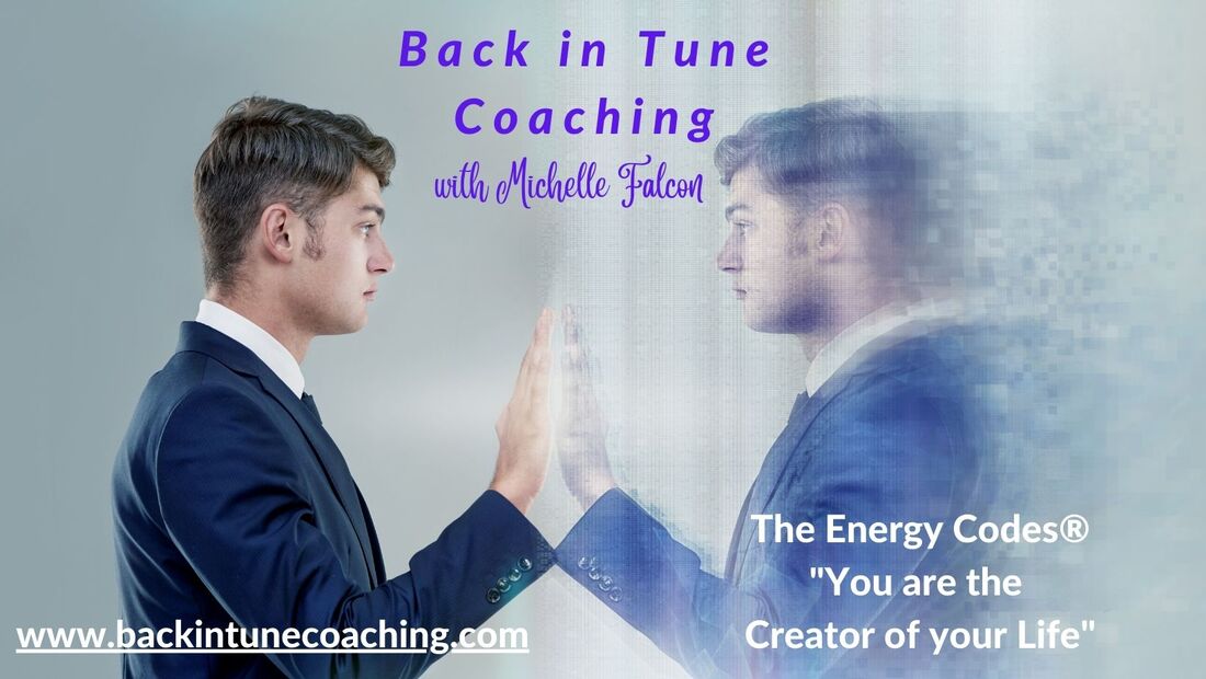 Male holding his reflection Picture, you are the creator of your life, The Energy Codes coach UK, Michelle Falcon